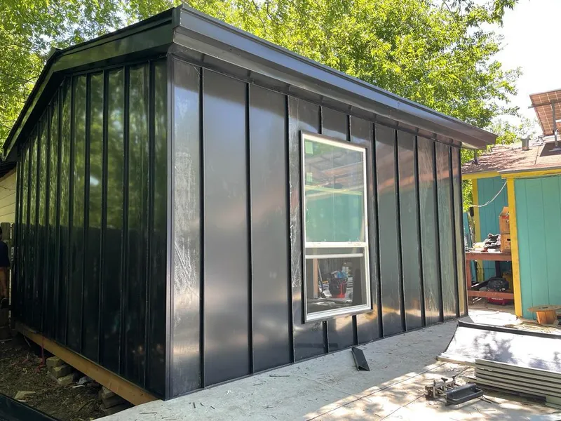 Black standing seam metal wall panels for Roof Inspection in Warwick